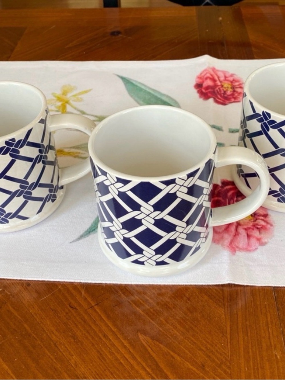 (3) Tommy Hilfiger blue & white rope design mugs like new. 3 1/2" wide, 4" tall.